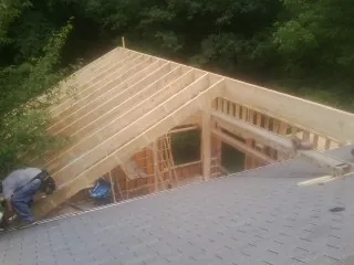 Framing a new roof addition that ties into an existing shingle roof in Knoxville
